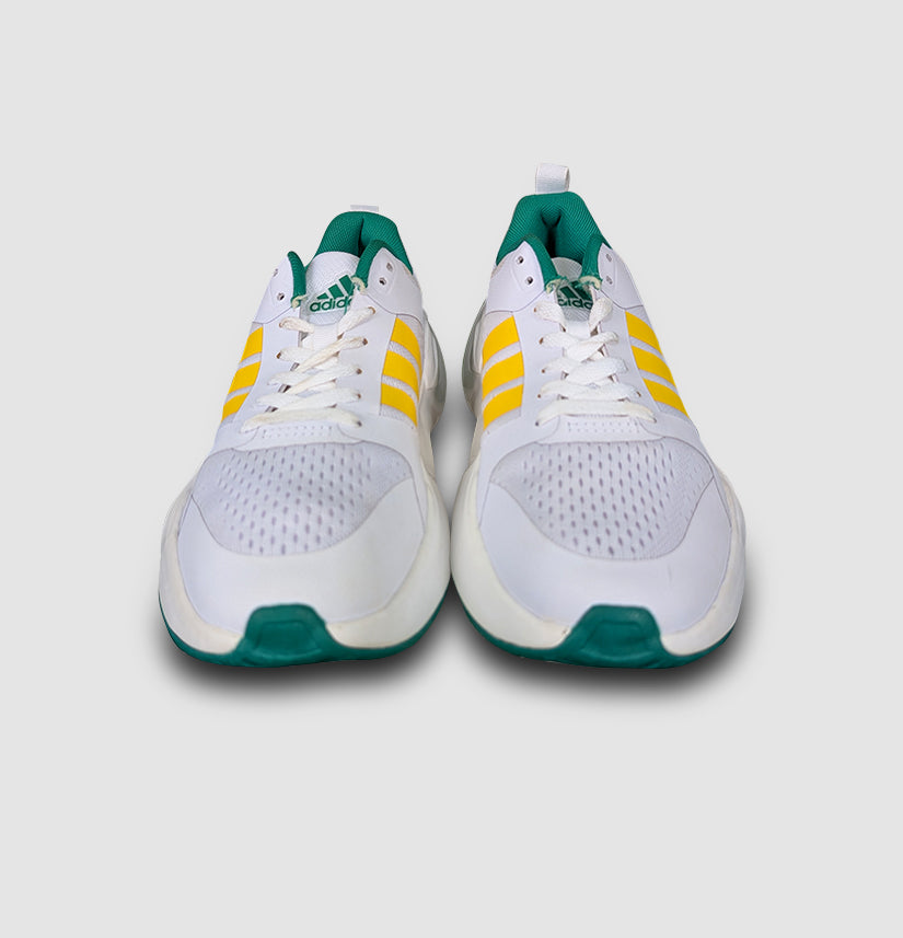 Adidas Lightstrike Pro in White with Yellow stripes – men’s running shoes designed for speed, lightweight comfort, and bold style.